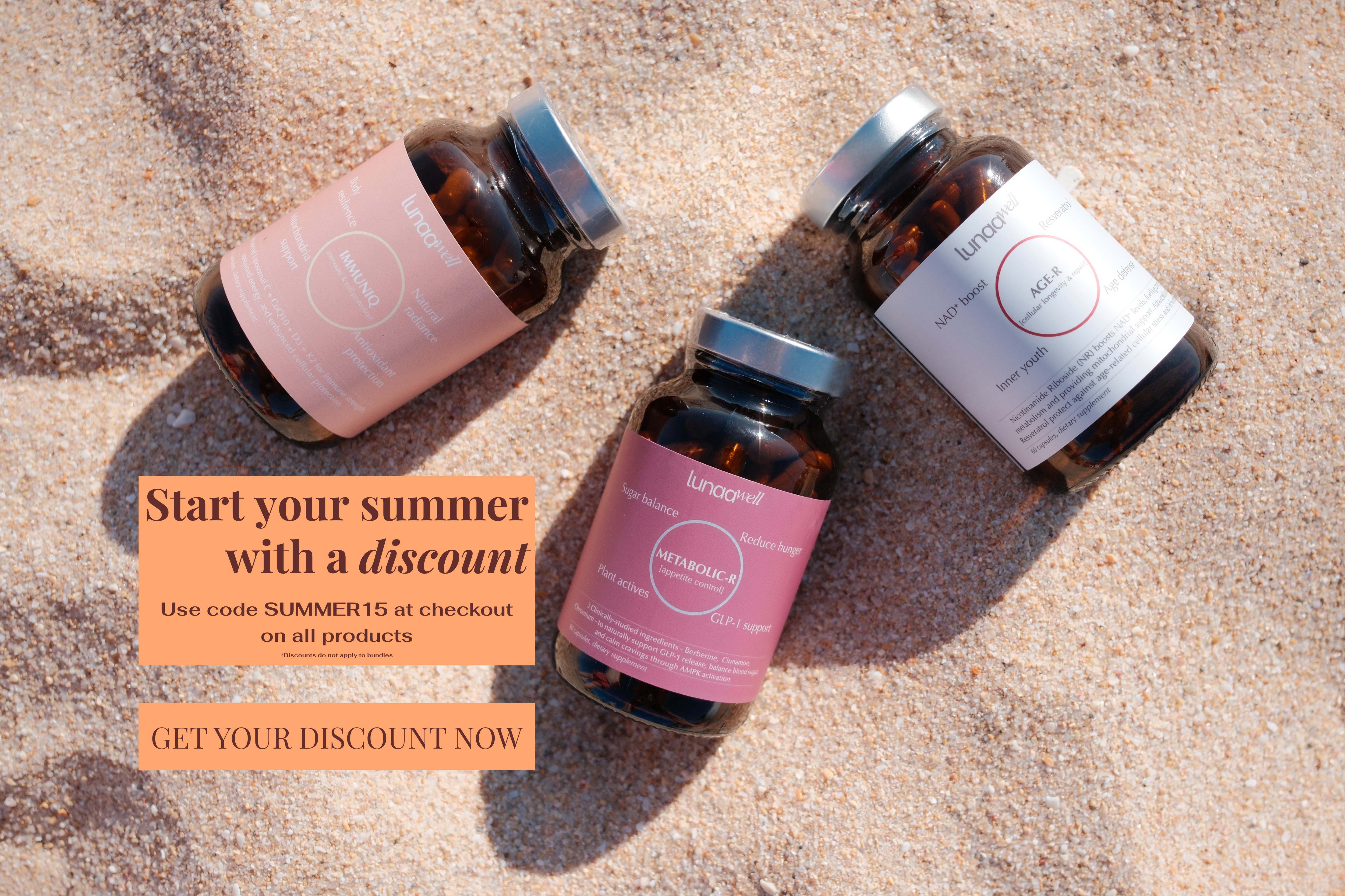 Three supplement bottles on a sandy surface, promotional text overlay.